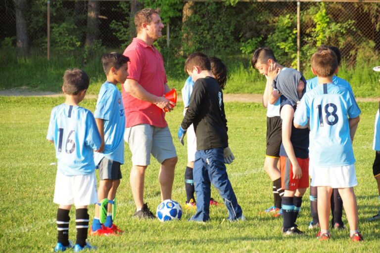 Volunteer Football Coach Faces Assault Charge After Incident with Student